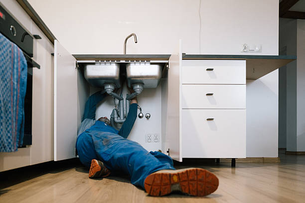 Professional Drain Cleaning technician working in Madbury, NH